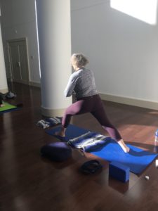 woman practicing yoga nidra lunge