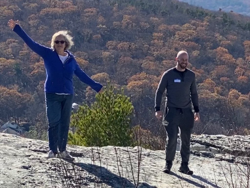 Two people hiking at Sam's Point