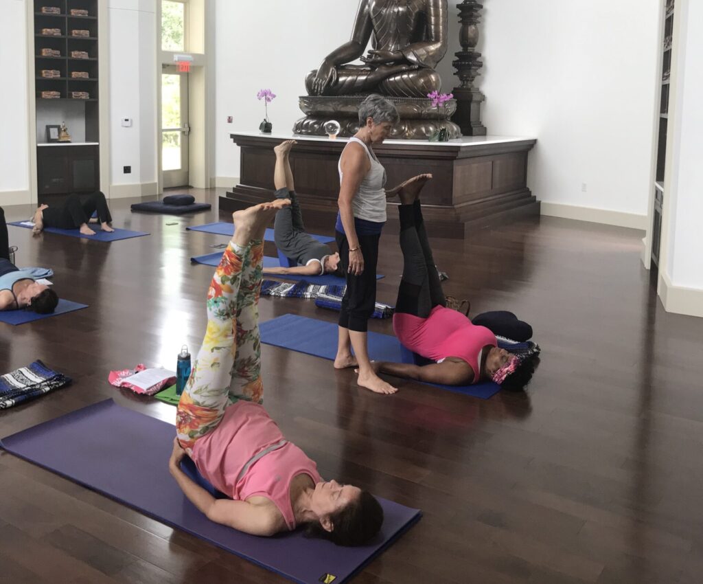 Amba Winkler helps yoginis with yoga nidra