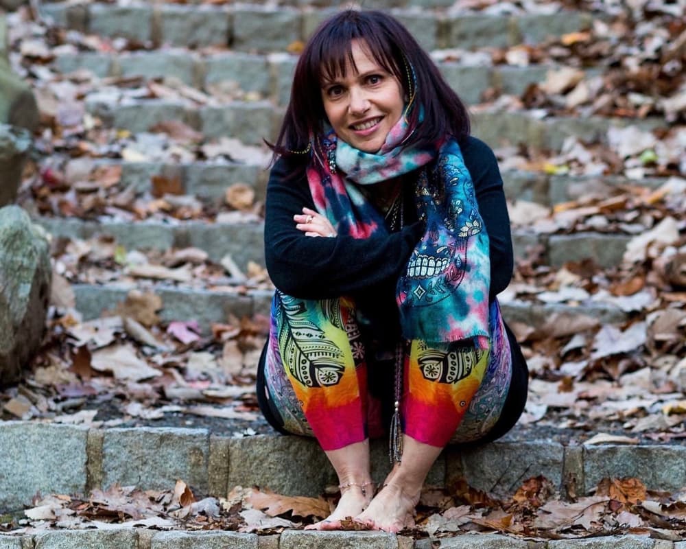 woman in tie-dyed yoga pants